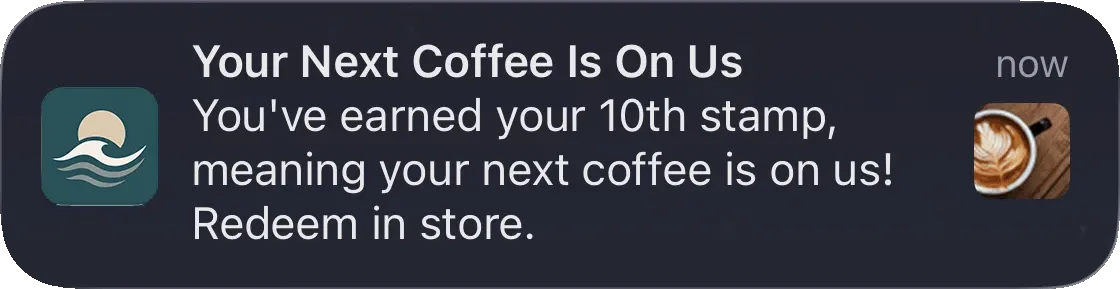 A push notification from a coffee roaster’s app reading “Your Next Coffee Is On Us – you’ve earned your 10th stamp.”